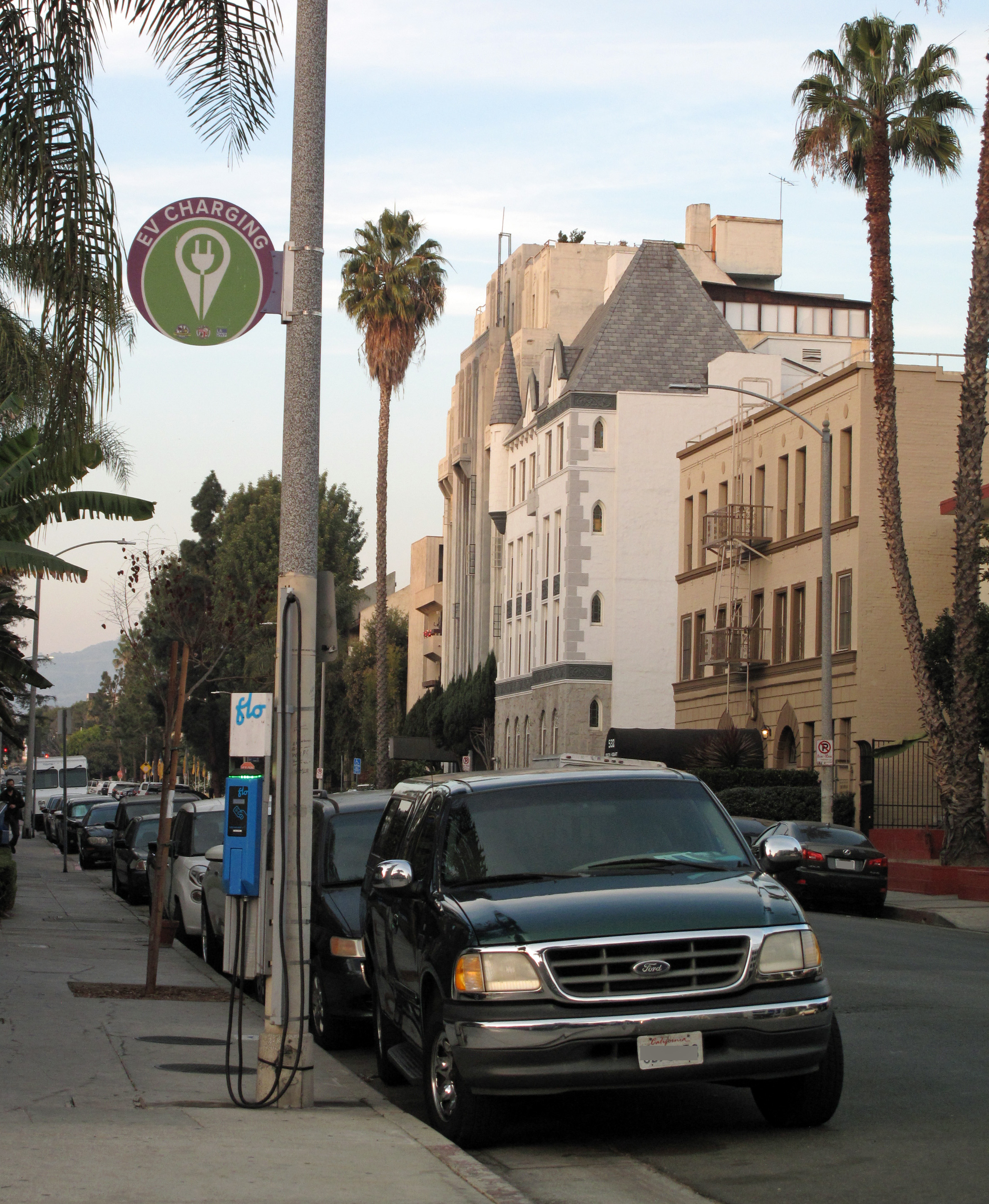 A curbside electric-vehicle charging station on a Los Angeles street.