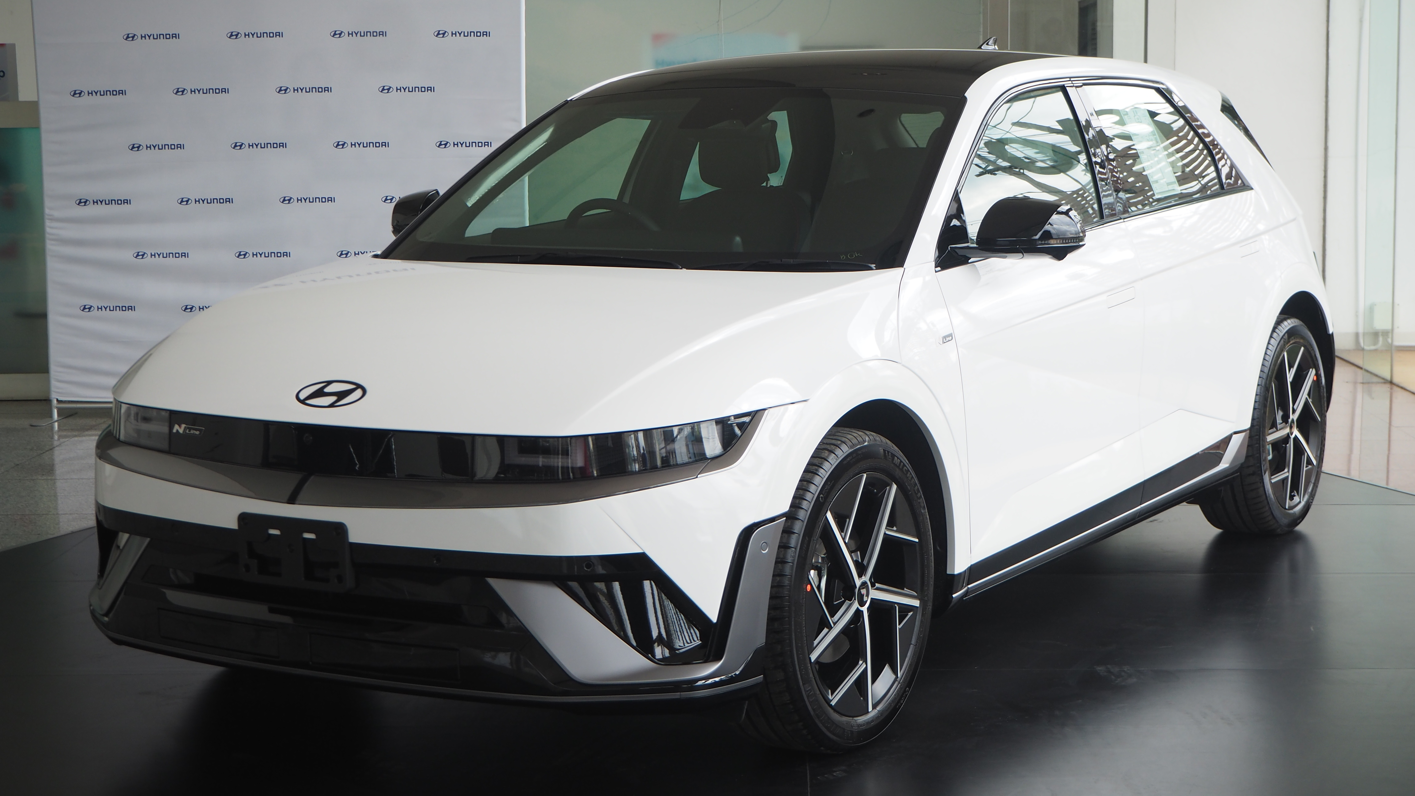 White Hyundai Ioniq 5 N Line on display indoors.