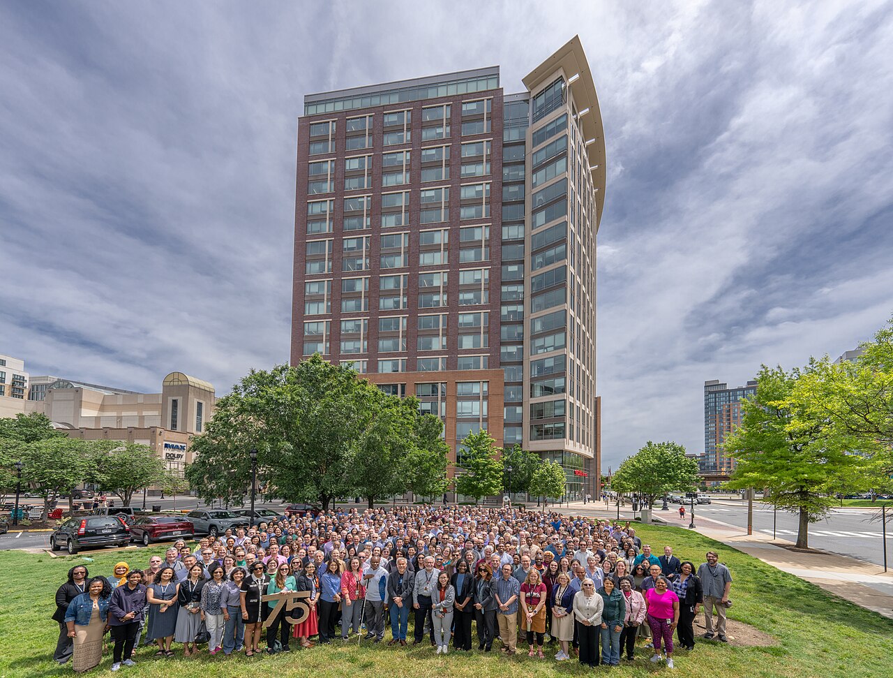 NSF staff outside an office building.