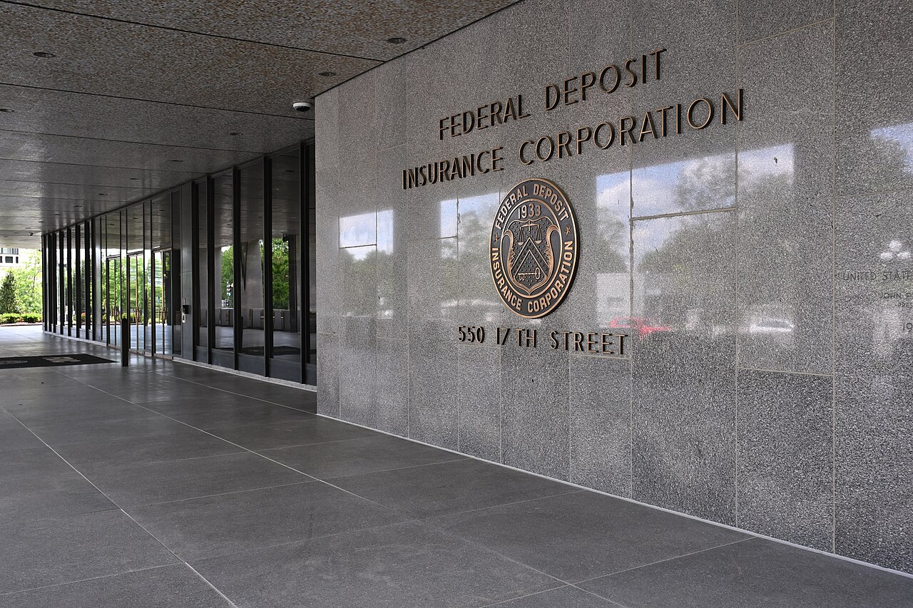 FDIC lettering and seal beside an office entrance.
