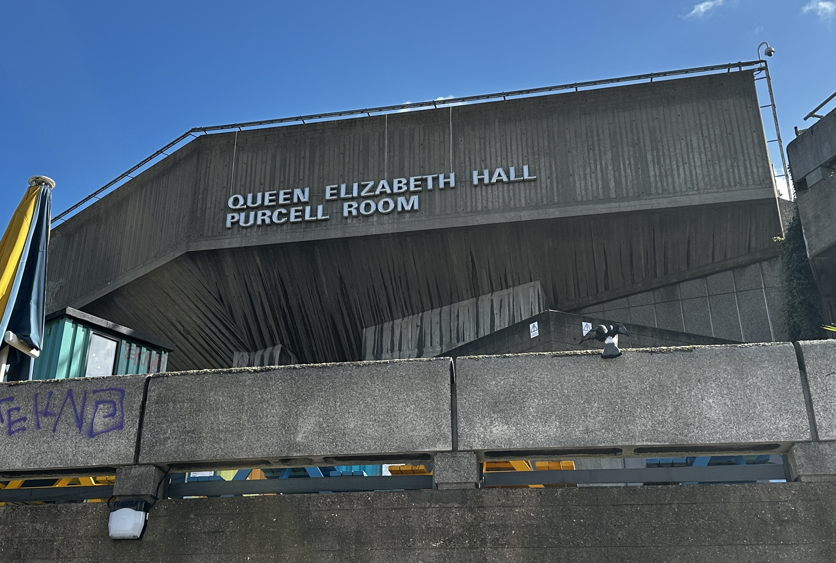 Queen Elizabeth Hall and Purcell Room lettering on a concrete building.