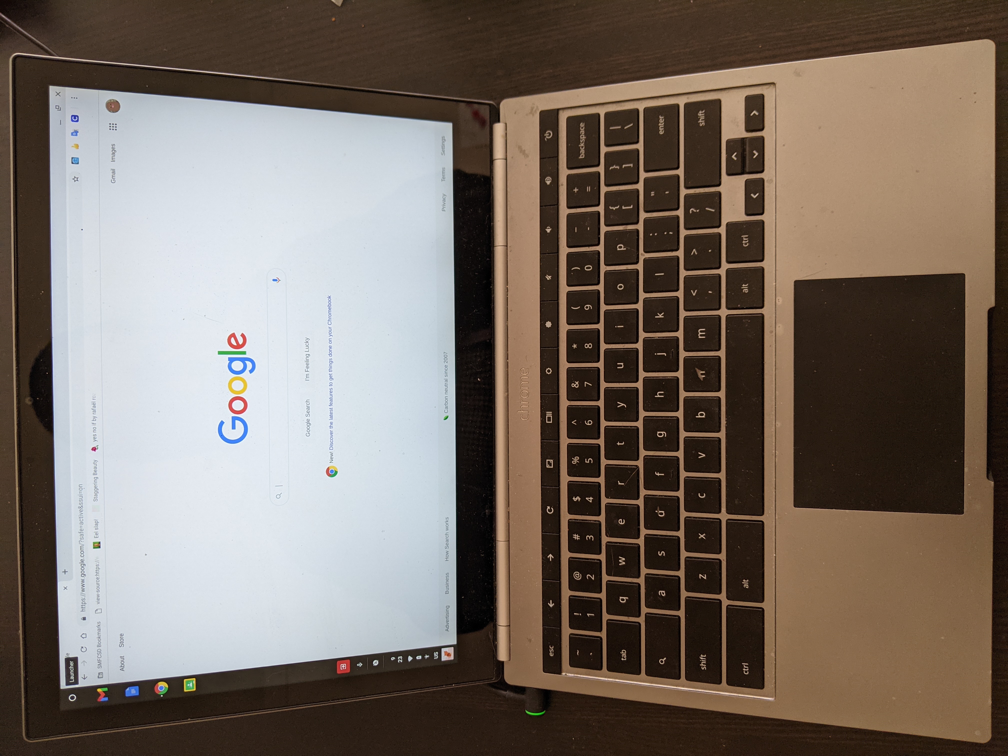 An open Chromebook Pixel displaying the Google homepage in Chrome.