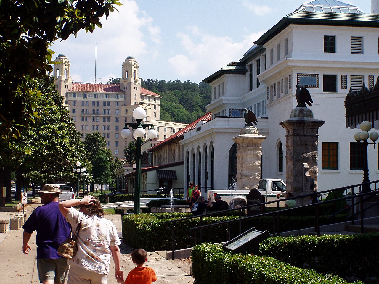 Bathhouses beside a pedestrian path.