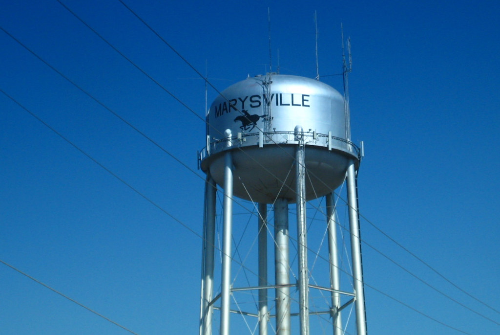 A raised water tank marked Marysville stands above its support legs.