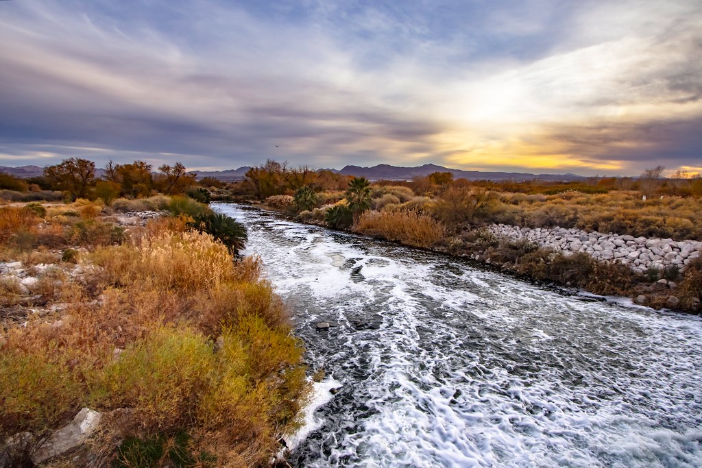 File photo (2025): a waterway flows between vegetation and rock embankments at Clark County Wetlands.