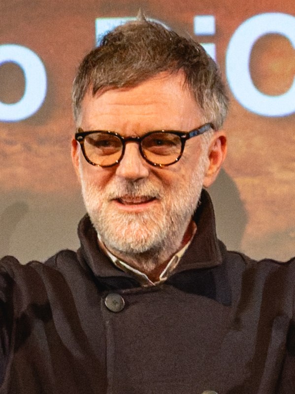 Paul Thomas Anderson speaking into a microphone.