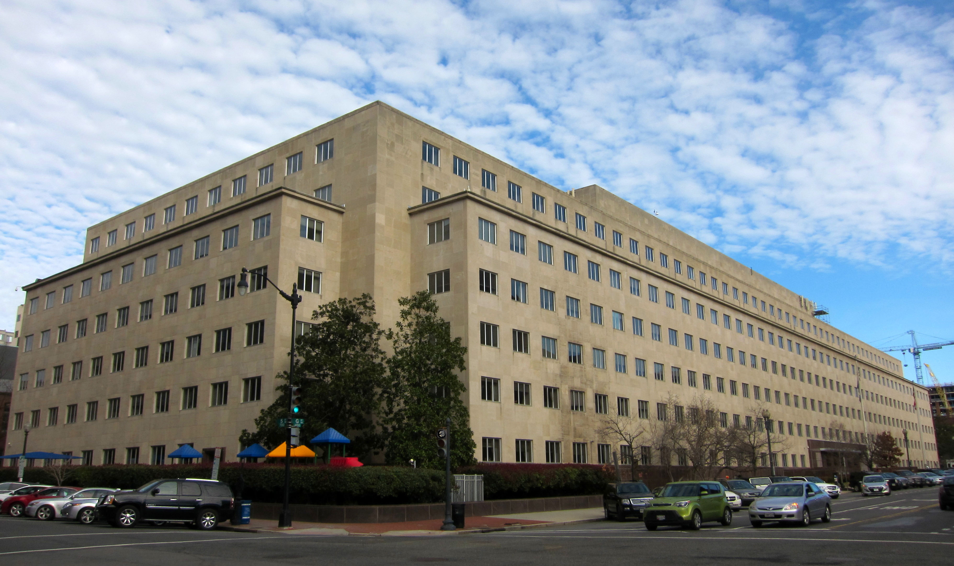 GAO’s broad stone headquarters beside a city street.