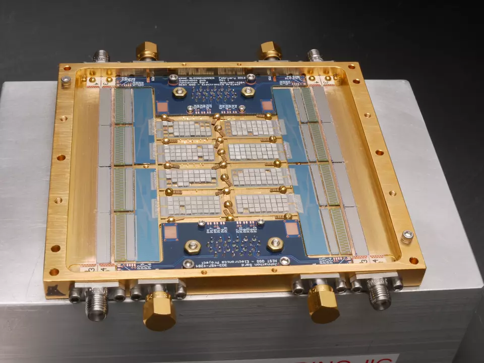 Gold-framed sensor array.