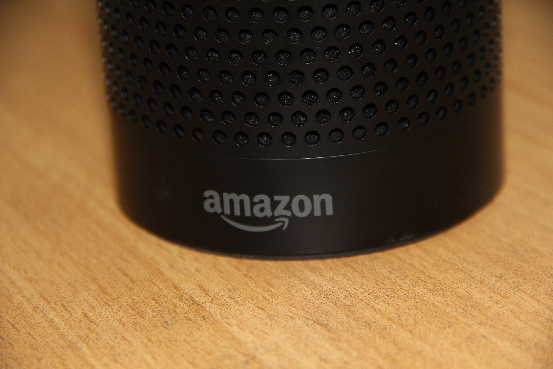 Close-up of the base and grille of an Amazon smart speaker.