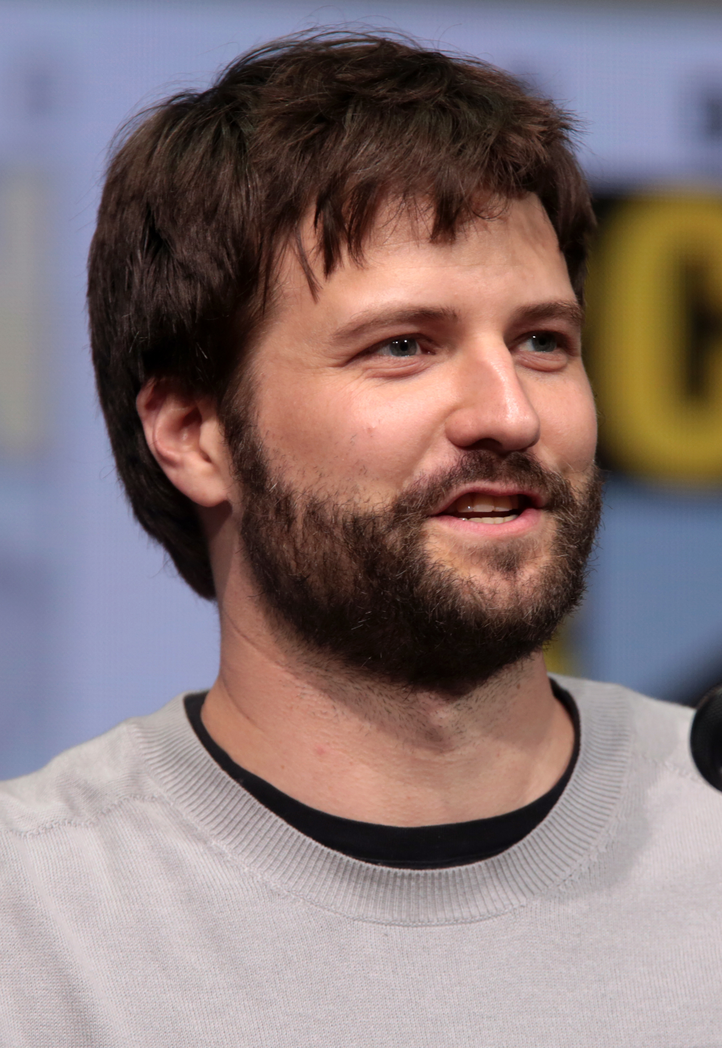 Ross Duffer speaking at a convention panel