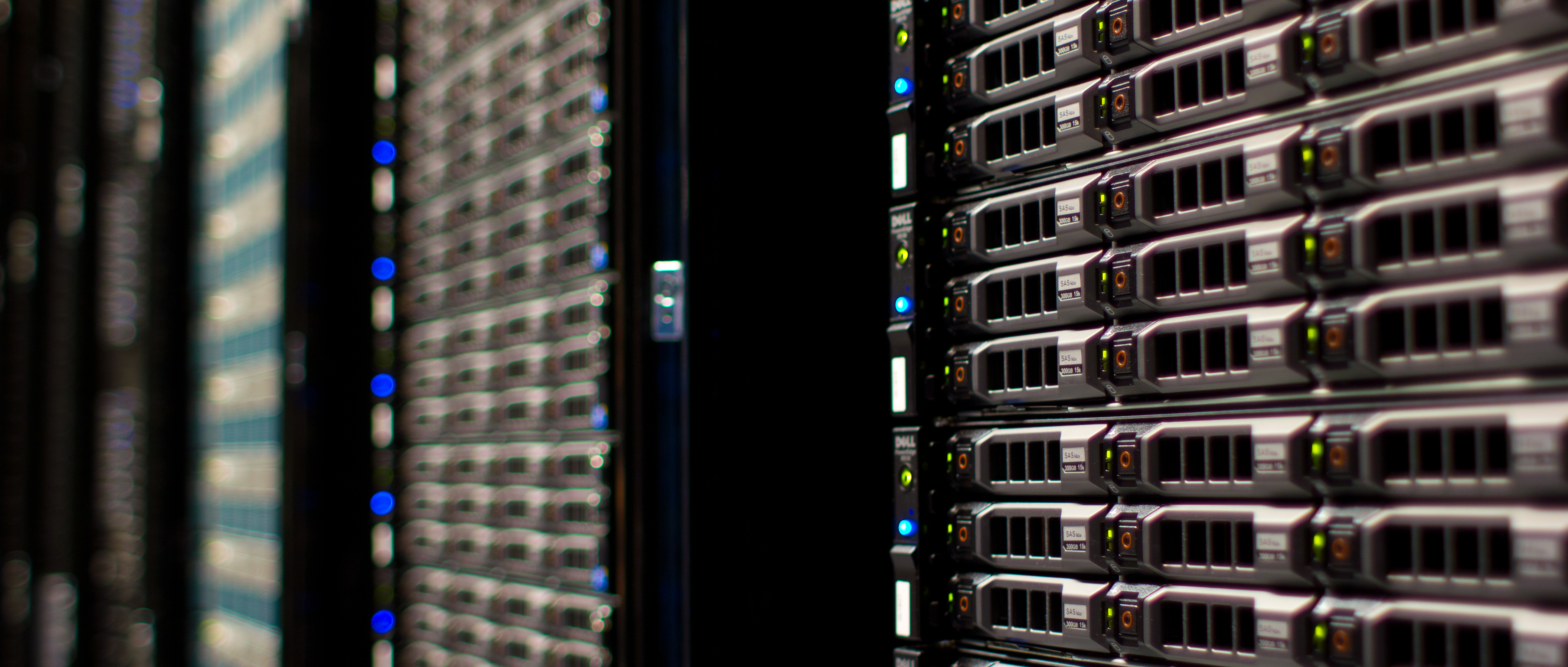 Rows of rack-mounted servers with disk bays and indicator lights.