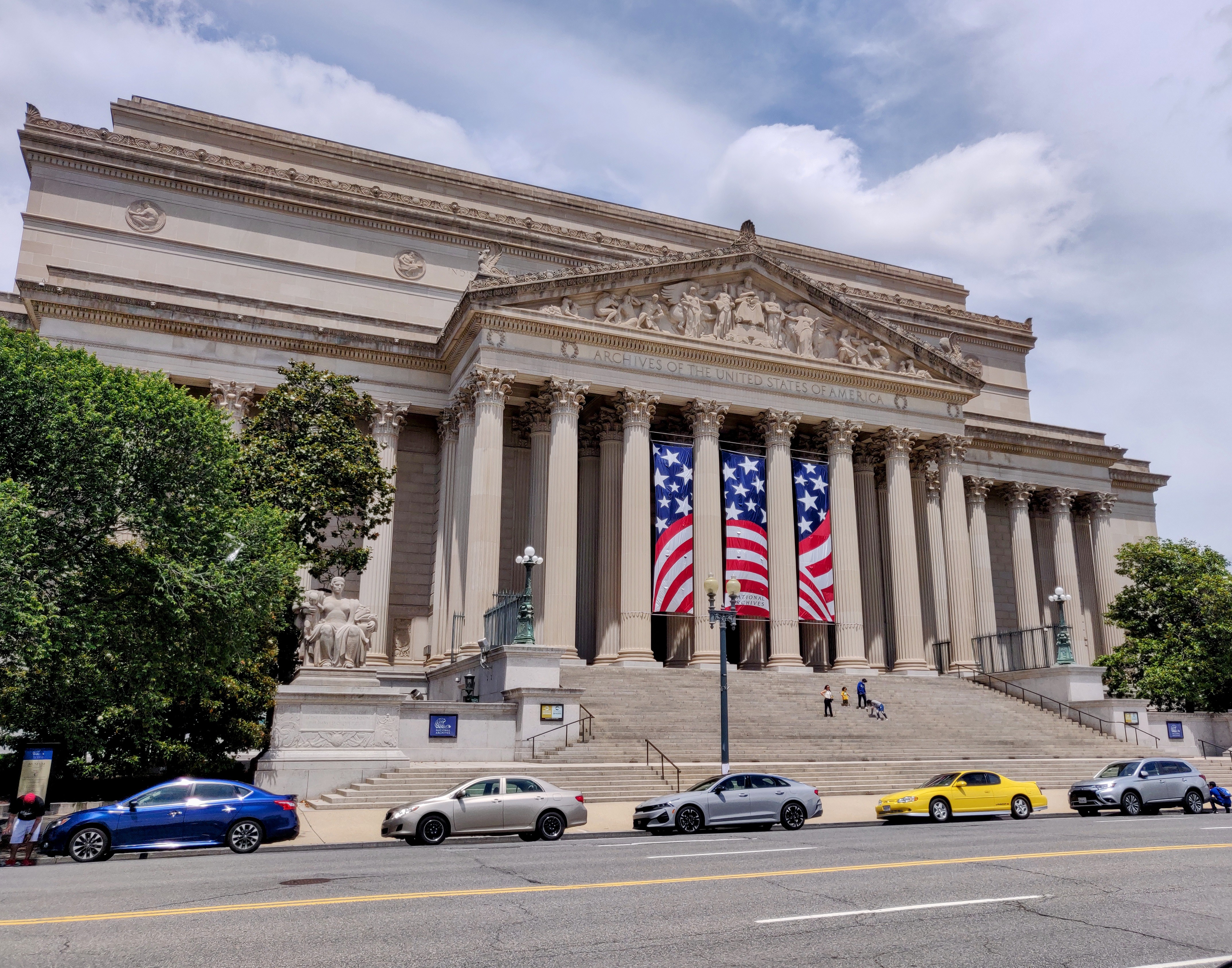 Columns, American-flag banners and steps at the National Archives Building.